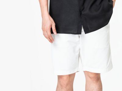 thoughtful man in linen clothes with finger on mouth isolated on grey background